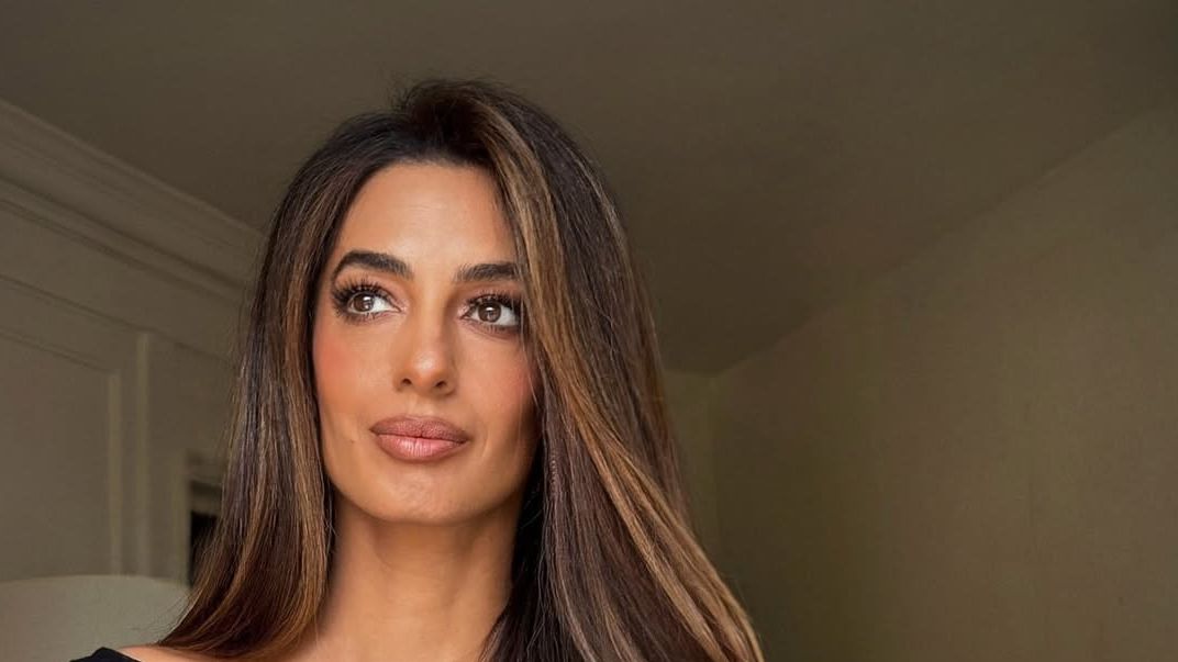 Amal Clooney’s Blurred Lip Look Has Everyone Talking. Here’s Why